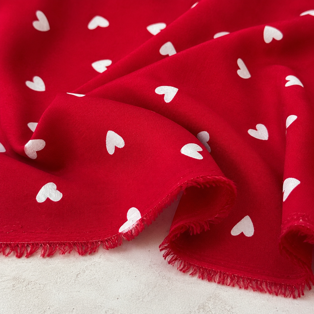 Red Background with White Heart Pattern - 100% Cotton Content - Viscose Fabric - 59 Inches