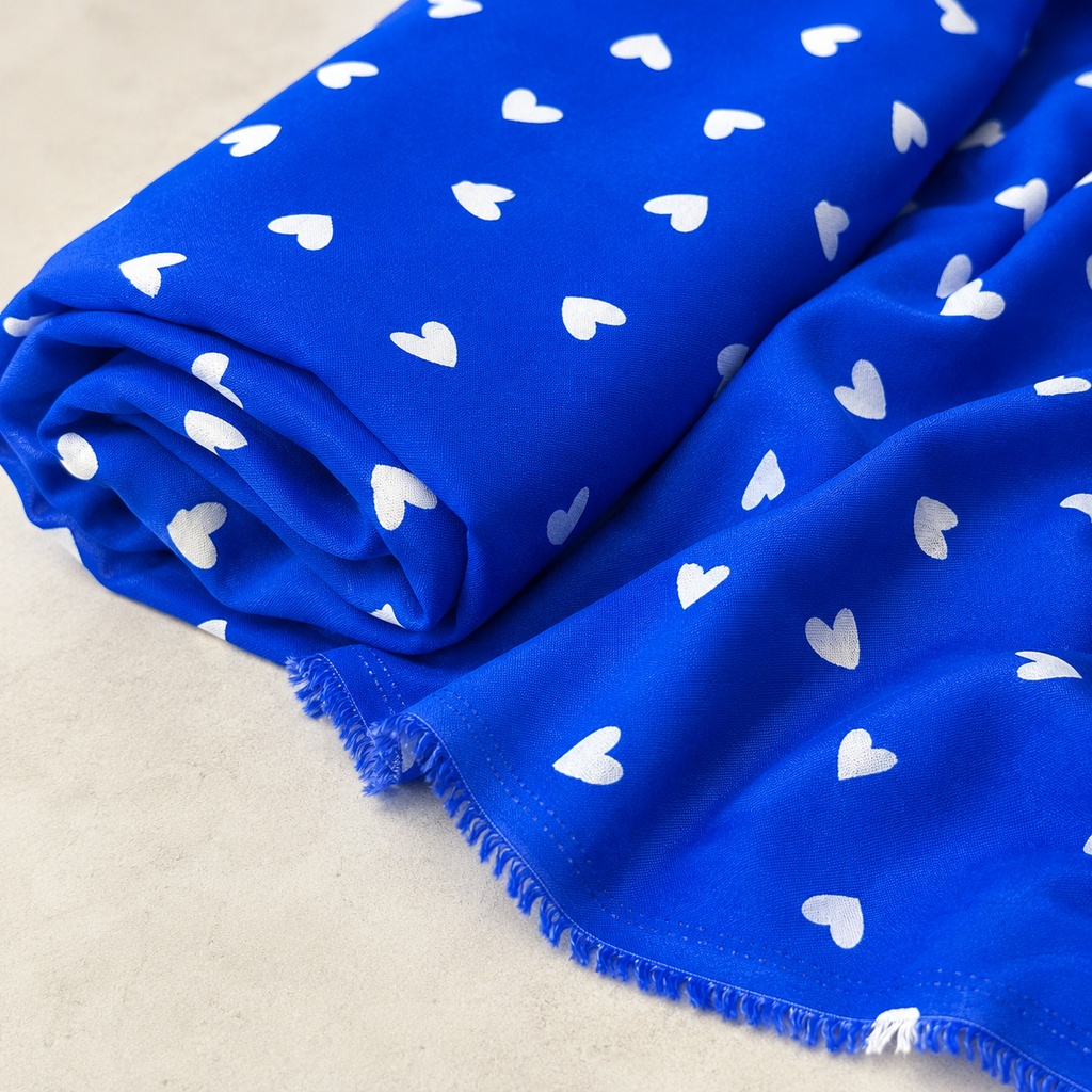 Royal Blue Background with White Heart Pattern - 100% Cotton Content - Viscose Fabric - 59 Inches