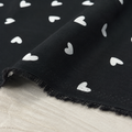Black Background with White Heart Pattern - 100% Cotton Content - Viscose Fabric - 59 Inches