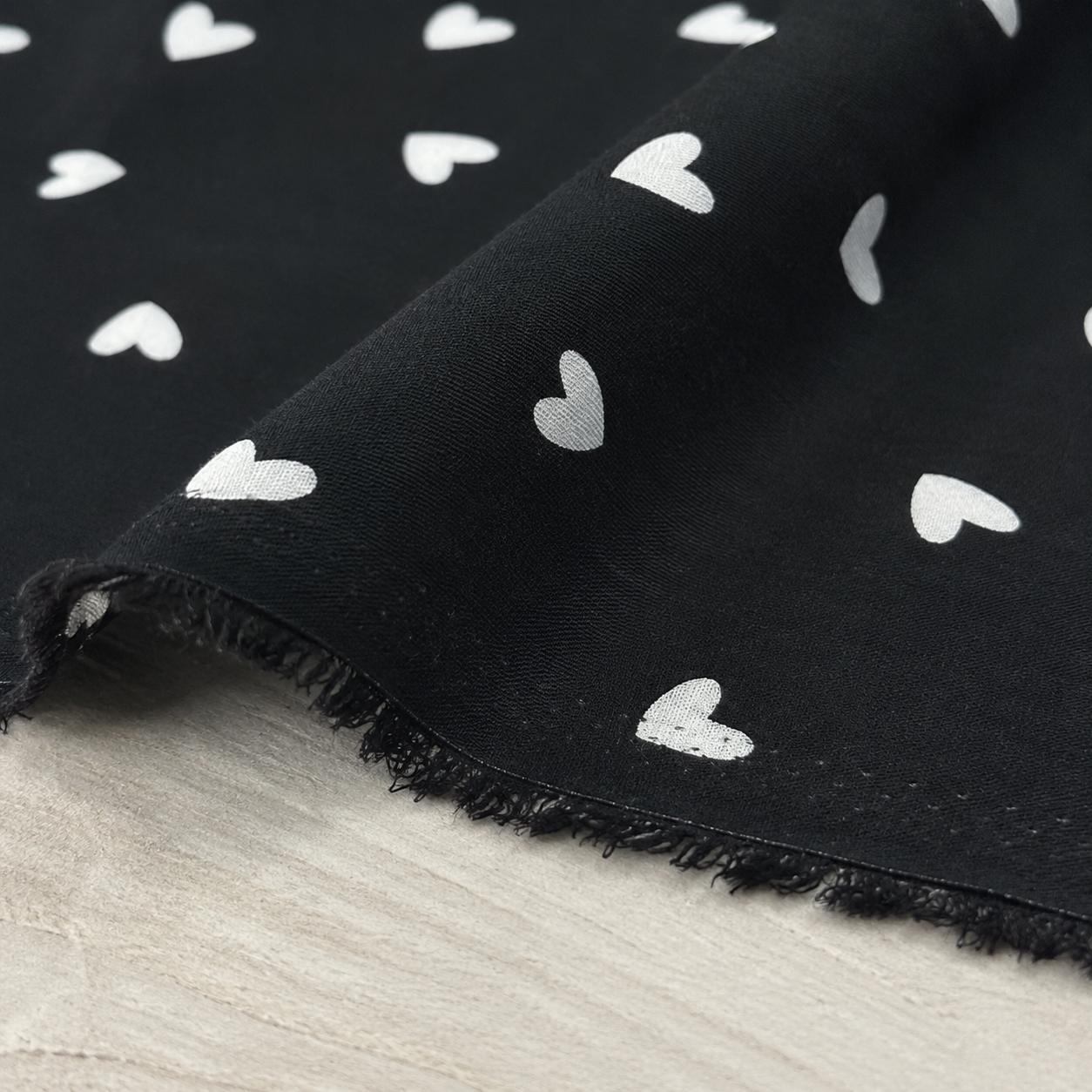 Black Background with White Heart Pattern - 100% Cotton Content - Viscose Fabric - 59 Inches